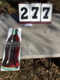 Metal Coca-Cola sign w/ grommets, 4 3/4