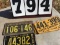 Group of 4 license plates (40's - 50's), 1 front & back set from 1942