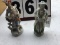 Pair of ceramic Victorian figurines, marked Japan on bottom, approx. 11
