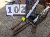 Metal basket with old hammers, tools, charger, etc.