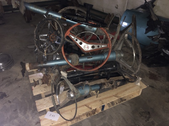 Pallet of steering columns with wheels
