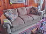 Upholstered Couch 3 Cushioned Seatswith Brass Tacks and Decorative Accent Pillows