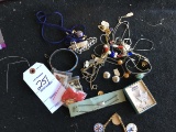 Group of costume jewelry: necklaces, bracelets, pins, etc.