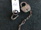 Old lock (no key) & a piece of a single tree