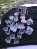 Assorted glass wear including candle stick holders, dessert dishes, punch cups, etc.