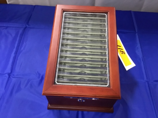 The Complete Collection of Uncirculated 1976 Two Dollar Bills; Contains 12 bills ($2 each); encased