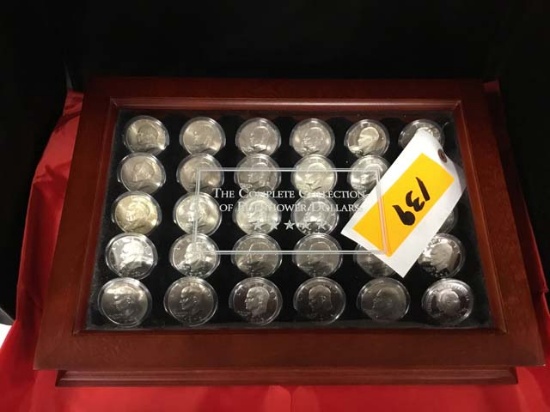 The Complete Collection of Eisenhower Dollars in wood display case (15x10x4) with hinged glass top;