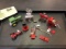 Nine Piece Miniatures Lot; includes Red Metal Tractor, Vintage Green Tractor