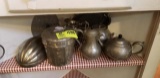 Group of Hammered Aluminum Tea Pots, Molds, and Covered Kreamer 2