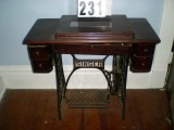 Singer Sewing Machine in Wood Cabinet, 34”x16”x31”
