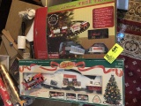 Two Holiday Tree Train Sets, Sweets Theme and Santa Land Theme, in boxes