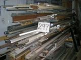 Material rack and contents, the rack has 3 uprights 8' tall, each has 2-24