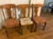 Three (3) Vintage straight back chairs, oak, classic design (2 w/red & gold cloth seats; one w/flora