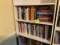 Group of books--management topics, references, novels and old texts