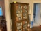 Entertainment center converted to a storage cabinet; 2 cabinet doors over 2 cabinet doors; front has