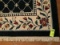 Blue wood rug 11' x 8.5' w/floral pattern border