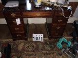 Elegant small desk (secretary) w/ 8 drawers including one center long and one file drawer) carved, w