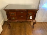 Formal buffet w/2 long drawers; glass protective cover on top; inlaid wood top; brass handles, marke