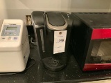 Keurig Coffee Maker w/filtered water holder; cup size regulator