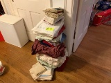 large group of bed linens--sheets, pillow cases, etc.