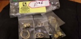 Fashion Jewelry--group of 6 pair of gold pierced ear rings, some loops, some button type, some knot