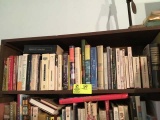 Shelf of wine reference books, approximately 40 books