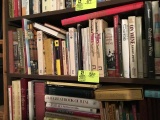 Shelf of wine reference books, approximately 40 books