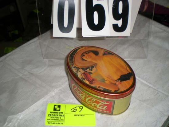 Oval Coca-Cola tin, 6 1/2" x 4 1/2"