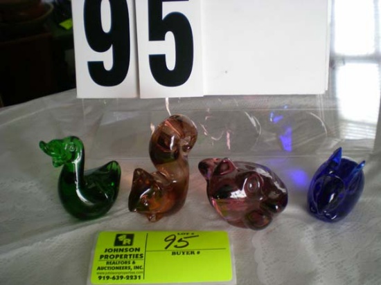 Glass duck, 3 1/2"; glass squirrel, 3 1/2"t; amber glass frog, 2 1/2"; blue glass rabbit