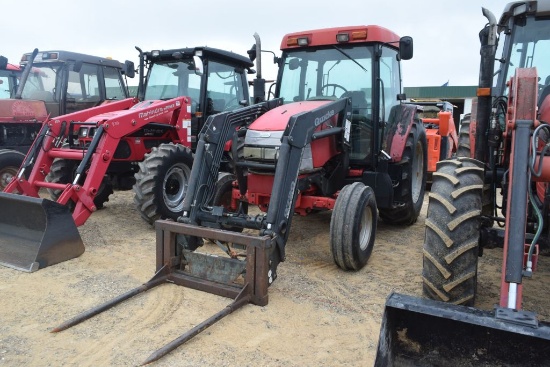 MCCORMICK CX95 2WD C/A W/ LDR AND HAY FORKS
