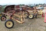 2 NH 256 HAY RAKES 3 SPARE TIRES AND POLE