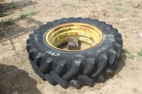 ARMSTRONG 16.9-30 TIRES AND JD WHEELS