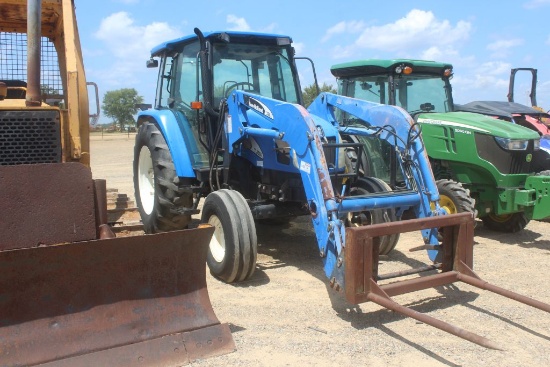 NEW HOLLAND TL100A C/A 2WD W/LDR AND BUCKET 4759HRS (WE DO NOT GUARANTEE HOURS)