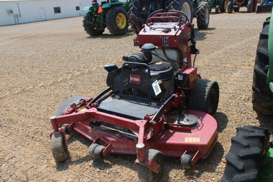 GRAND STAND TORO STAND BEHIND MOWER