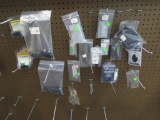 Assortment of Glock parts, grip ext, guide rod, charging handle, slide plat