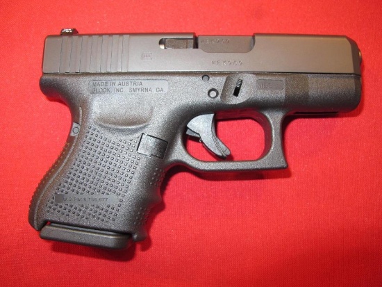 Glock 26 9mm auto, unfired, has night sights, and original sights in origin