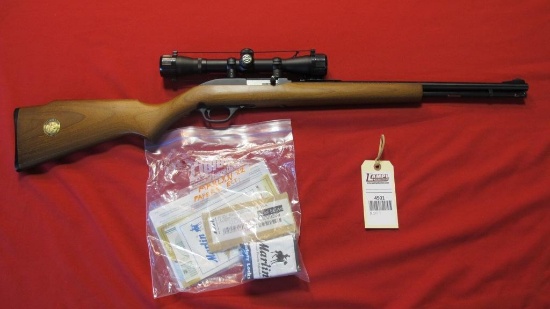 Marlin 60 22lr semi auto w/scope, squirrel stock with owners manual and gun