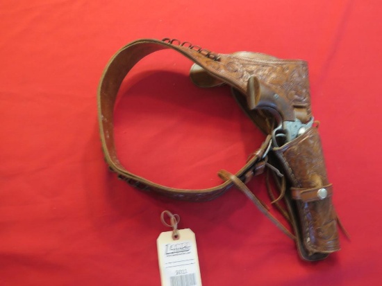 Revolver prop gun w/leather holster  , tag# 5011
