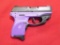 Ruger LC9 9mm semi auto pistol, purple frame, soft case, crimson tracer las