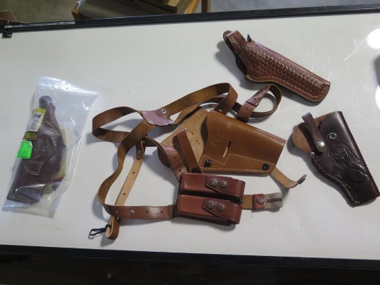 (4) Brown leather holsters, tag#6753