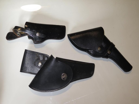 (3) Black leather holsters, tag#6756