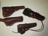 (4) Brown leather holsters, tag#6750