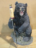 Standing ceramic bear with 17