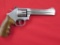 Smith & Wesson 617-6 .22LR 10 shot double/single action revolver, wood grip