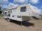 1994 Sandpiper 26RK Fifth Wheel Camper; camper has a leak in rear corner; R