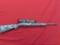 Ruger 10/22 .22LR semi auto, 50yr anniversary, camo, matching scope, 1 mag,