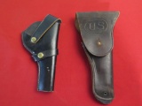 2 leather holsters, one marked US, tag #3509
