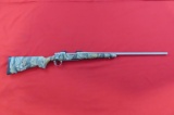 Remington 700 257Wby Mag bolt rifle, stainless barrel, camo stock, Rocky Mo