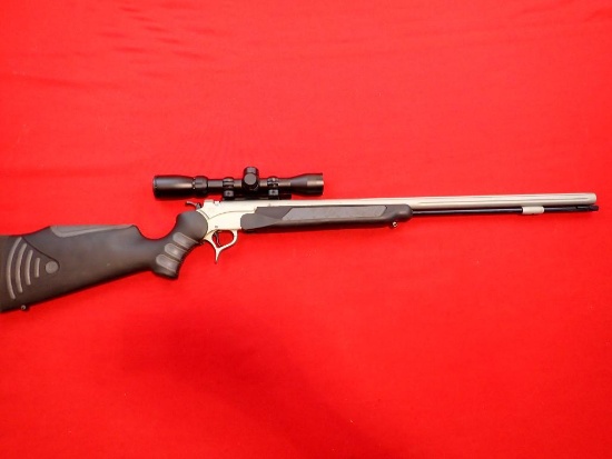 Thompson Center Pro Hunter FX 50 cal black powder rifle, 2x7-32 scope, quic