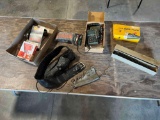 Magellan GPS, holsters, duck call, gun sights, ammo belt, etc.~tag#3948